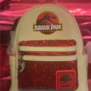 GROTTO TREASURES EXCLUSIVE - LOUNGEFLY JURASSIC PARK RED SEQUIN MINI BACKPACK